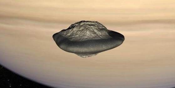 土星旁邊竟有兩枚“飛碟”衛星(圖)