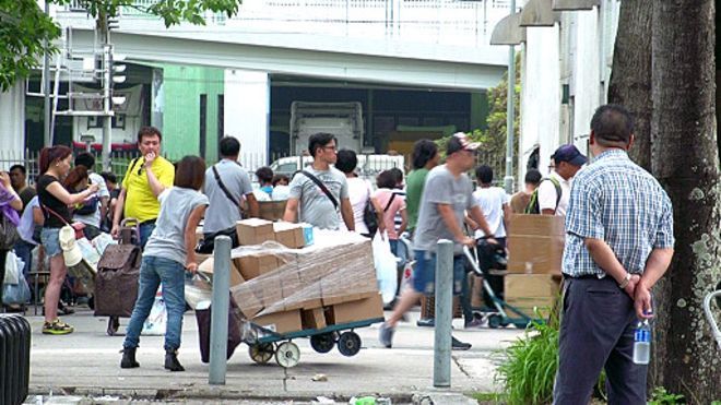 广州人看“陆港矛盾”(组图)