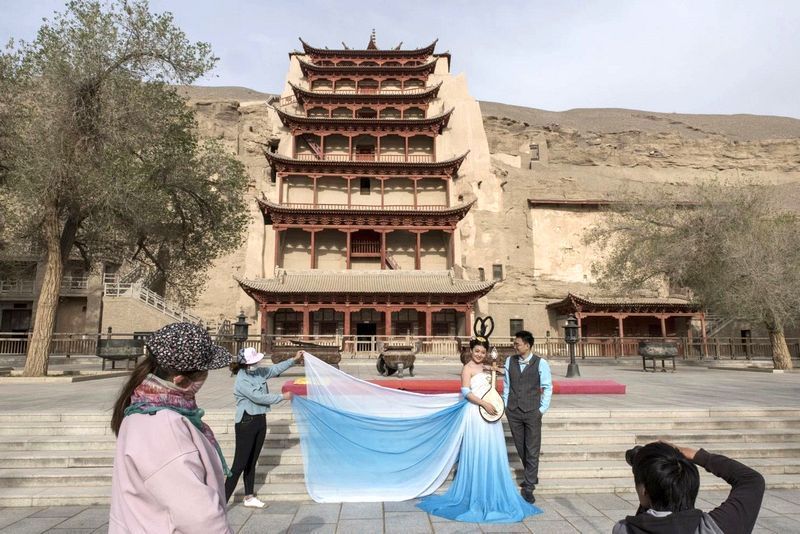 敦煌石窟面臨最大的挑戰︰遊客 （組图）